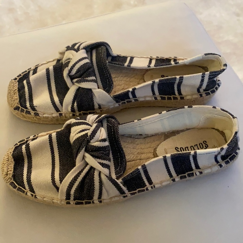 Navy and white Soludos flats